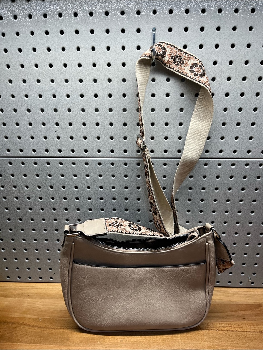 Neutral Beige Crossbody Bag with Patterned Strap